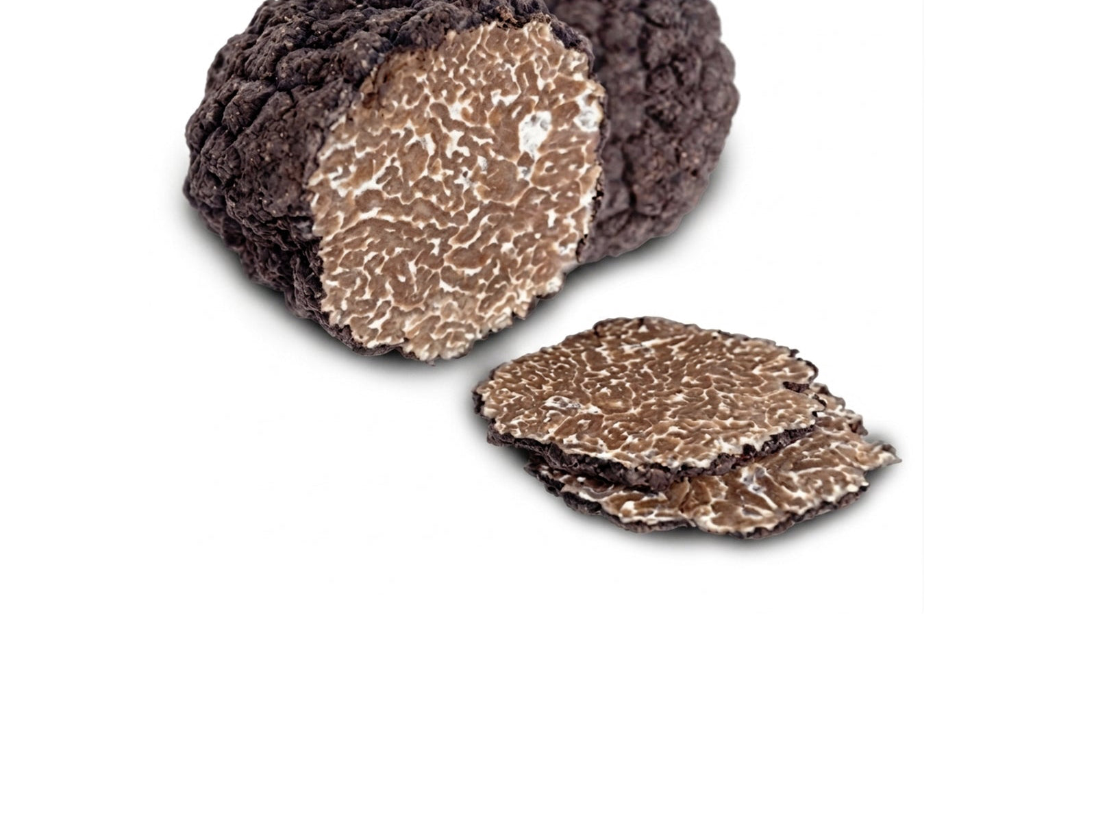 Cut Burgundy truffle, Tuber aestivum syn. Tuber uncinatum, showing mature brown gleba and white veins
