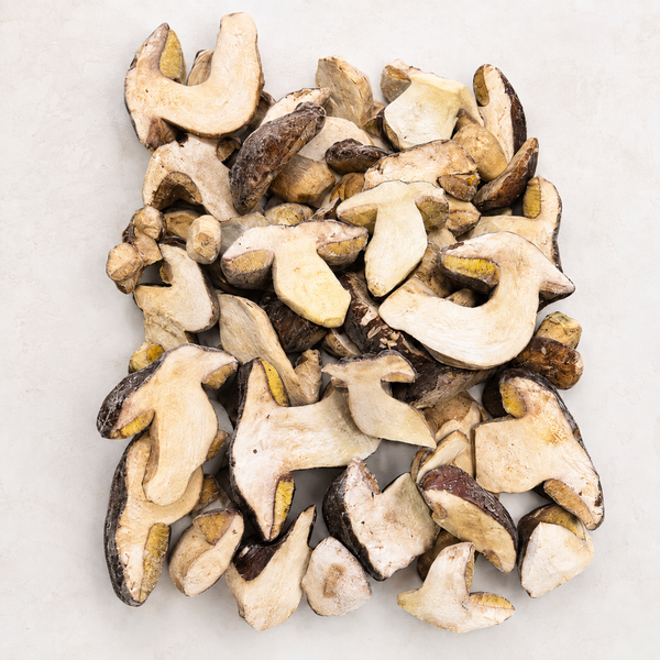 Oregon frozen split porcini mushrooms on a clean white background