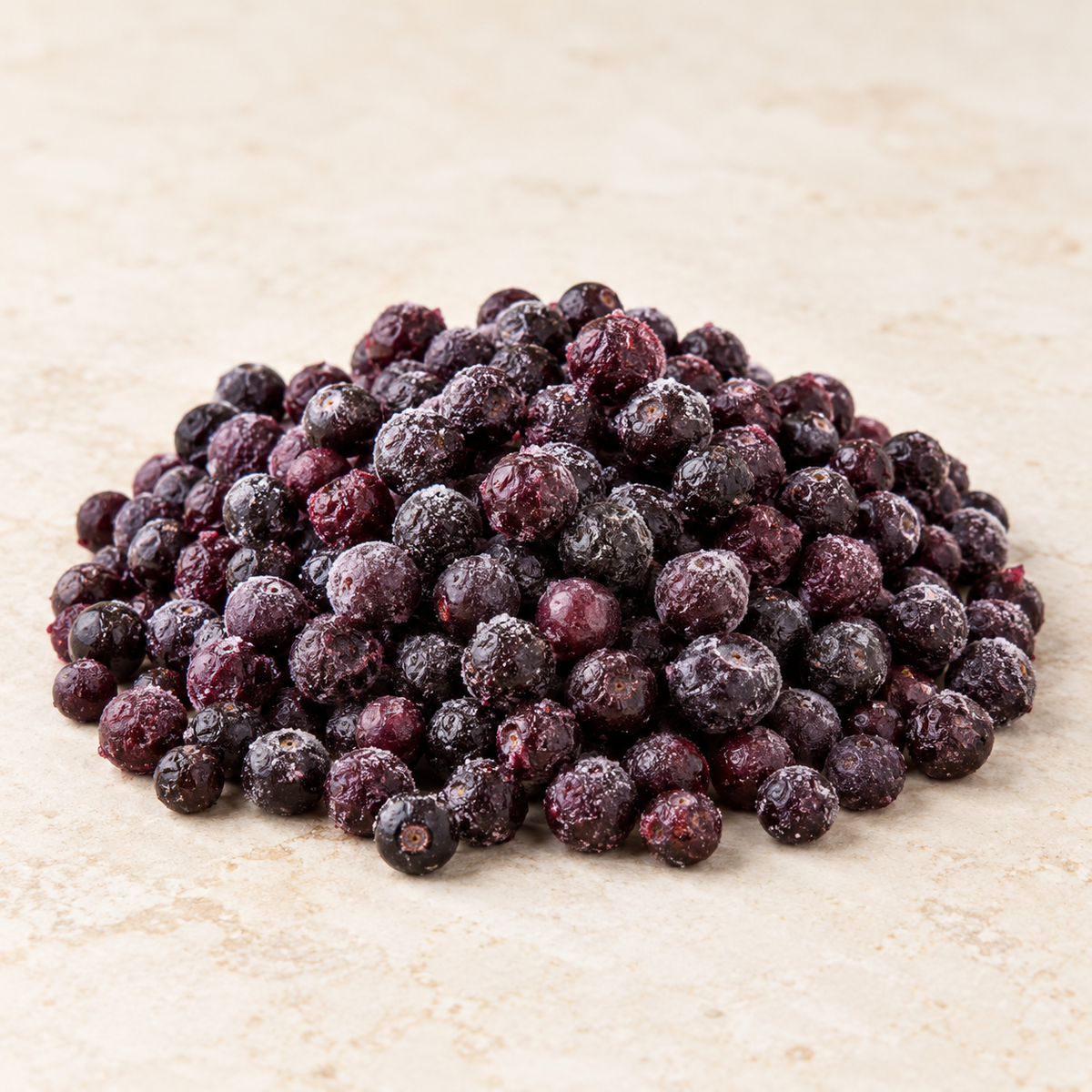 frozen-coastal-huckleberries-on-a-warm-ivory-studio-surface